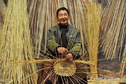 Folk artworks, handicrafts exhibited in Beijing